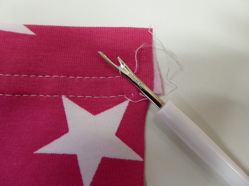 undoing_the_last_few_stitches.jpg undoing_the_last_few_stitches.jpg